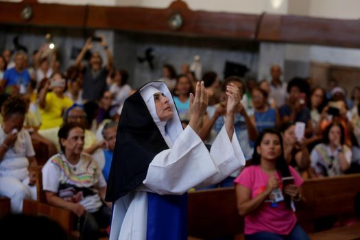 salvador, bahia, brazil - october 13, 2019: woman wears the clothes of a Santa Dulce dos Pobres nun during a theatrical presentation at the sanctuary of the saint in Salvador