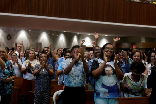salvador, bahia, brazil - october 13, 2019: Devotees of Santa Dulce of the Poor are seen during mass at the Santa Sanctuary in the city of Salvador.