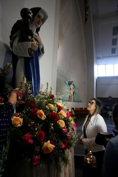 salvador, bahia, brazil - october 13, 2019: return of the nun Santa Dulce dos Pobres seen with the sculpture of the saint in the sanctuary in the city of Salvador.