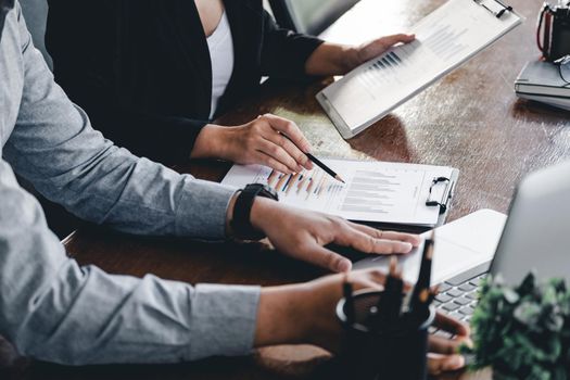 Close up Business people meeting to discuss the situation on the market. Business Financial Concept.