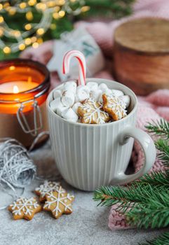 Cozy winter and Christmas setting with hot cocoa and homemade cookies