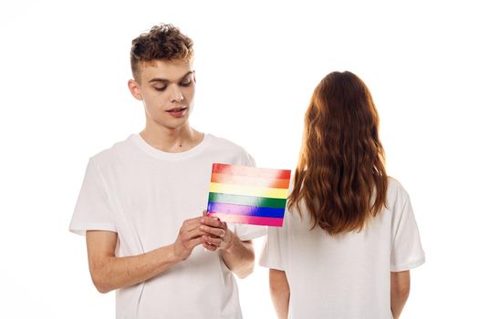 young couple lgbt Flag transgender lifestyle light background. High quality photo