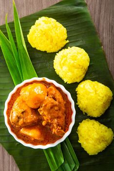 Turmeric Glutinous Rice also known as Nasi Kunyit. Normally eaten with dry curry chicken.