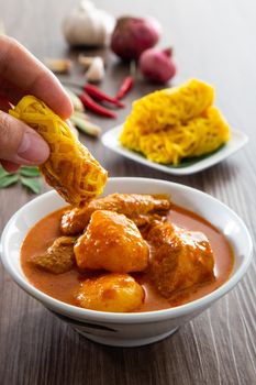 Roti Jala or lace pancake is Malaysian traditional food, a popular Malay snack served with curry dishes