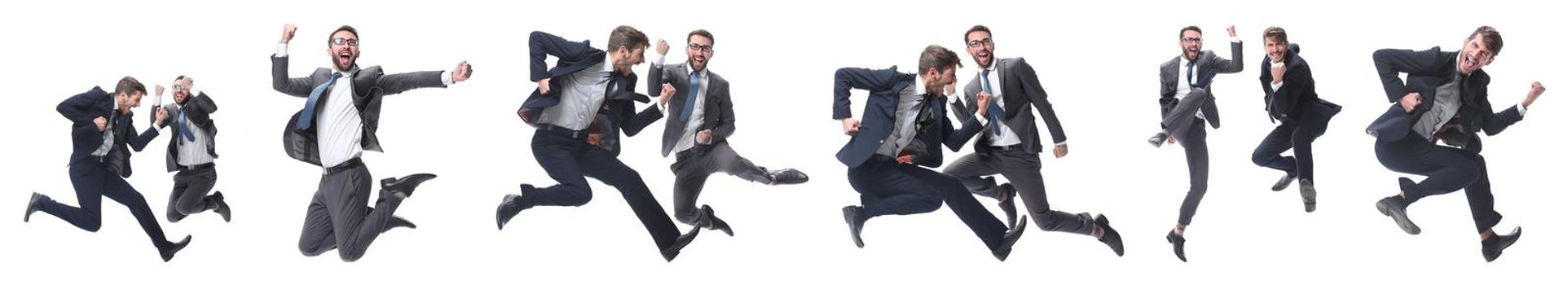 in full growth. two cheerful dancing business people. isolated on white background.