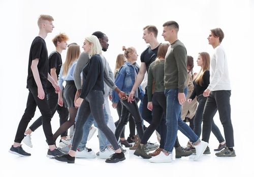 in full growth. diverse young people walking in different directions. photo with copy space
