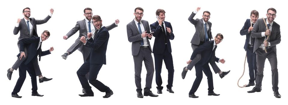 smiling businessman sitting on the back of his colleague . isolated on white background.