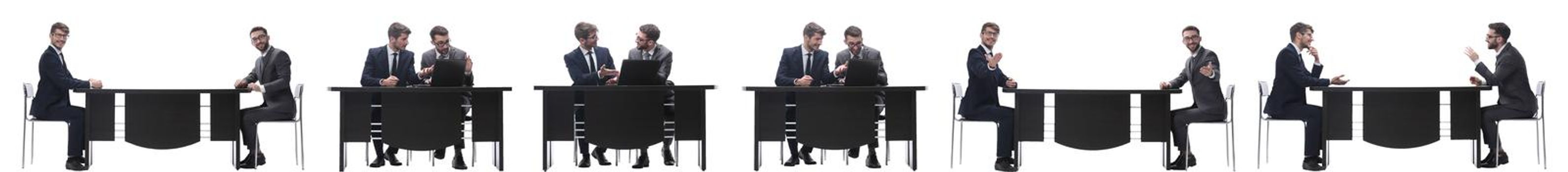 business colleagues discussing that the sitting at the table . isolated on white