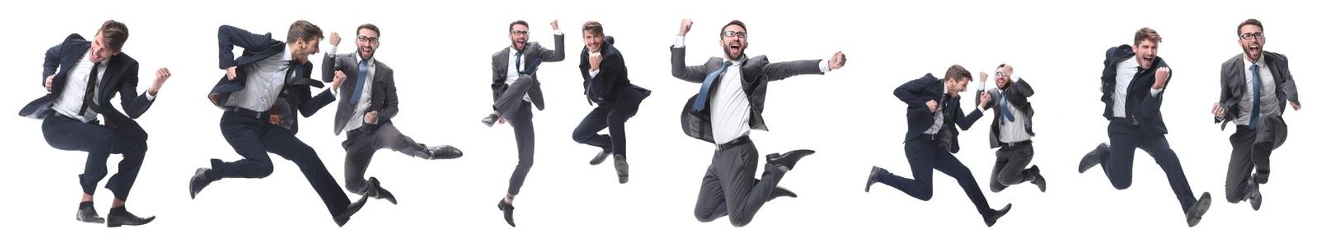 in full growth. two cheerful dancing business people. isolated on white background.