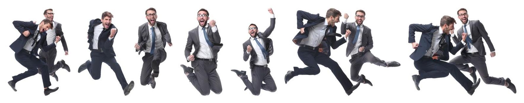 in full growth. two cheerful dancing business people. isolated on white background.