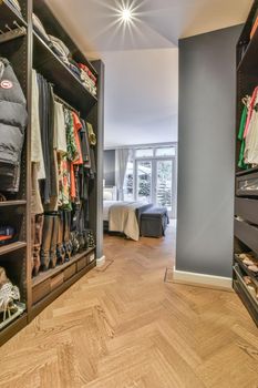 Wardrobe and cabinet in light room at home