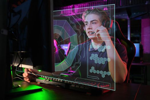 Professional photo of young male caucasian cyber sportsman in gaming club training for important match.. laser screen, projector, augmented reality, AR, VR