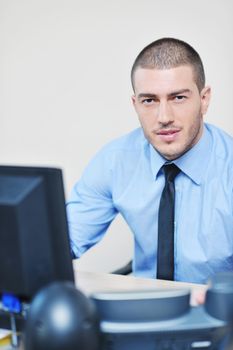 businessman with a headset portrait at bright call center helpdesk support office