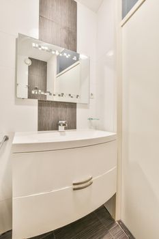 Cozy and stylish bathroom with luxury faucet and mirror