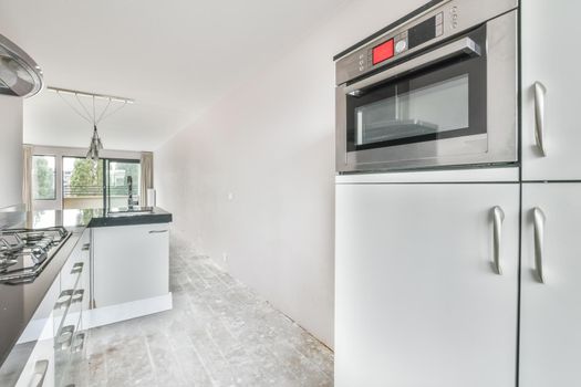 Cozy kitchen zone with in a spacious apartment