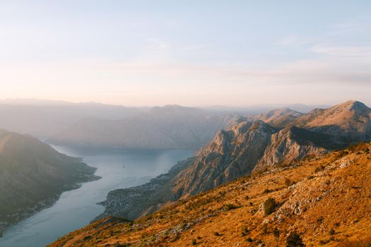 Stony mountains in the fog over the Kotor Bay. Mount Lovcen. High quality photo