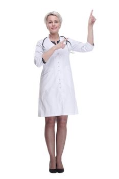 in full growth. female medic pointing somewhere to the side. isolated on a white background.