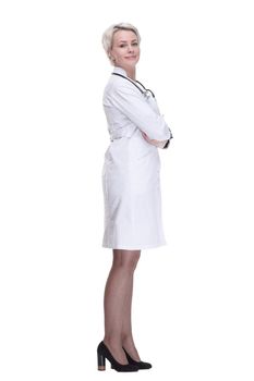 side view. serious woman doctor looking at a white blank screen . isolated on a white background.