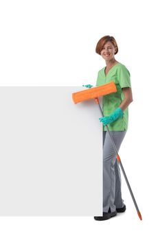 Cleaner woman with mop and blank banner isolated on white background, full length portrait