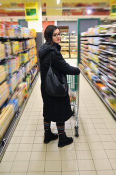 young woman buy and shop food in supermarket 