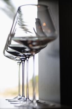 Empty very elegant wine glasses decorated on table