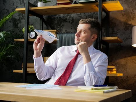 Procrastination and workplace boredom. An employee launches paper airplane.