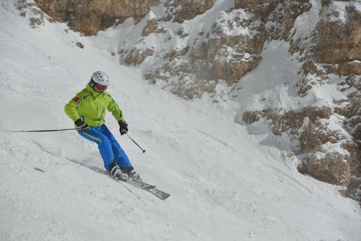 jumping skier at mountain winter snow fresh suny day