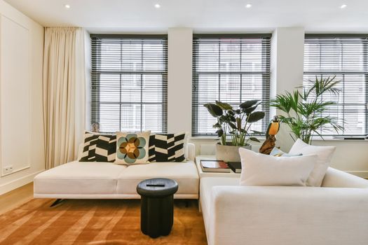 Stunning living room with white sofa and stylish throw pillows