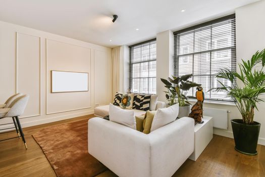 Stunning living room with white sofa and stylish throw pillows