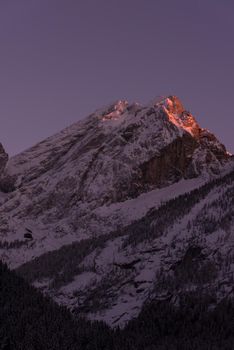 winter sunrise with fresh snow in alps mountains on fresh morning