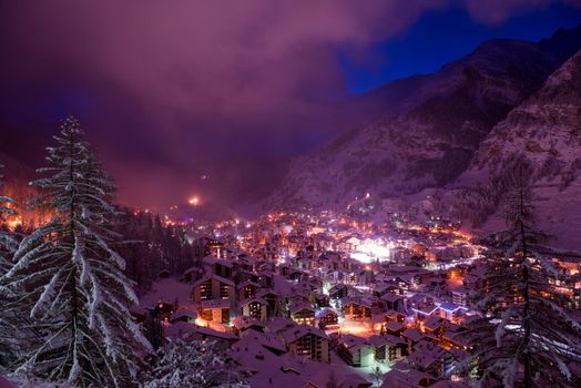 Aerial view on Zermatt valley and matterhorn peak at dusk with fresh snow in switzerland