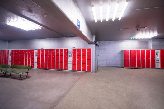 red safety lockers in empty Lockers Room