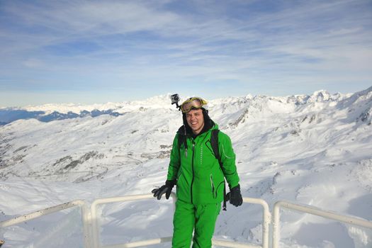 young athlete man have fun during skiing sport on hi mountain slopes at winter seasson and sunny day