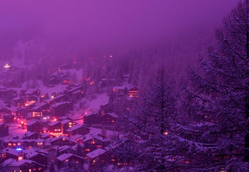 Aerial view on Zermatt valley and matterhorn peak at dusk with fresh snow in switzerland