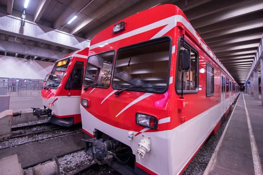 perspective view of empty subway station with modern train