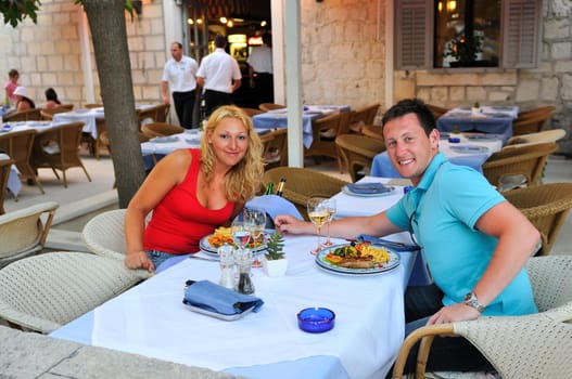 Young couple having dinner together