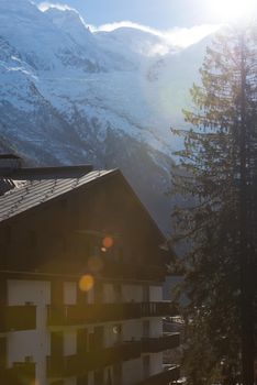 French alps mountain peaks covered with fresh snow. Winter landscape nature scene on beautiful sunny winter day.