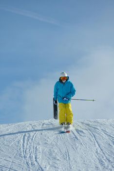 jumping skier at mountain winter snow fresh suny day