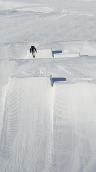 jumping skier at mountain winter snow fresh suny day