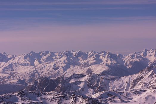 mountain landscape at winter with fresh snow on beautiful sunny day at french alps