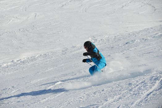 jumping skier at mountain winter snow fresh suny day