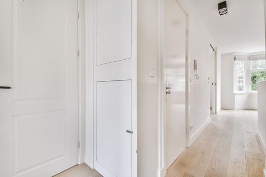 Empty room interior in daylight with parquet floor