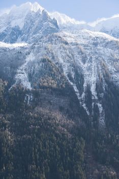 French alps mountain peaks covered with fresh snow. Winter landscape nature scene on beautiful sunny winter day.