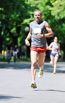 young man run marathon and recreating fitness sport