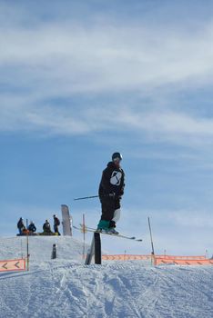 jumping skier at mountain winter snow fresh suny day