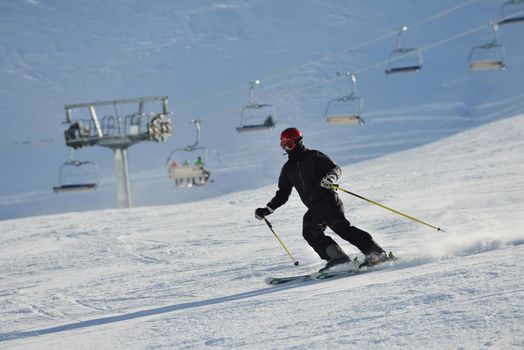 jumping skier at mountain winter snow fresh suny day