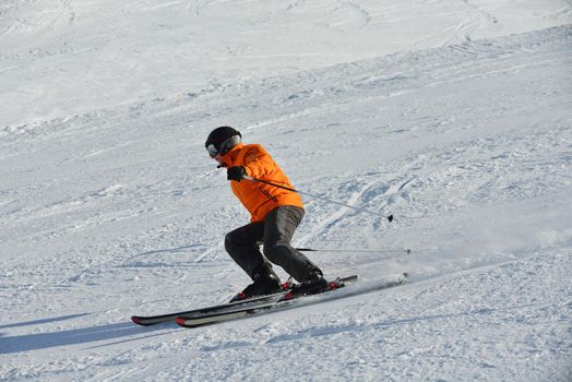 jumping skier at mountain winter snow fresh suny day