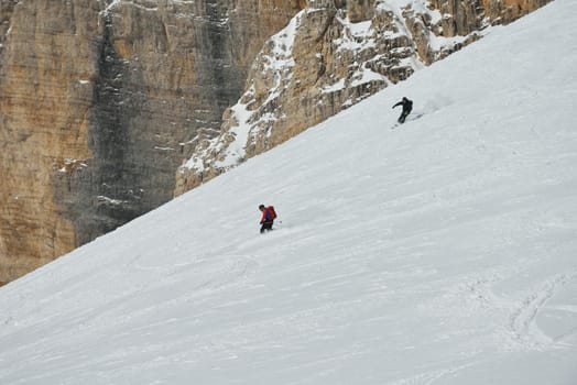 jumping skier at mountain winter snow fresh suny day