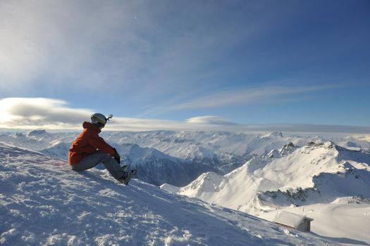 young athlete man have fun during skiing sport on hi mountain slopes at winter seasson and sunny day