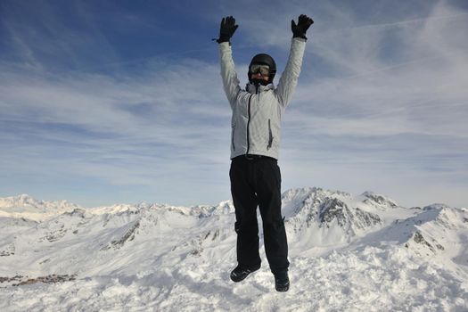 young athlete man have fun during skiing sport on hi mountain slopes at winter seasson and sunny day